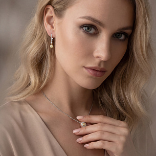 Серьги с английским замком из белого золота с бриллиантом