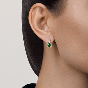 Серьги с английским замком из желтого золота с бриллиантами, изумрудами